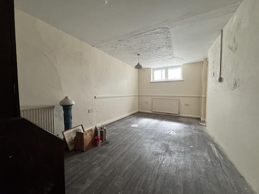 Lot: 78 - SHOP WITH OFFICE ACCOMMODATION ON UPPER FLOORS - Further shop area on the ground floor
